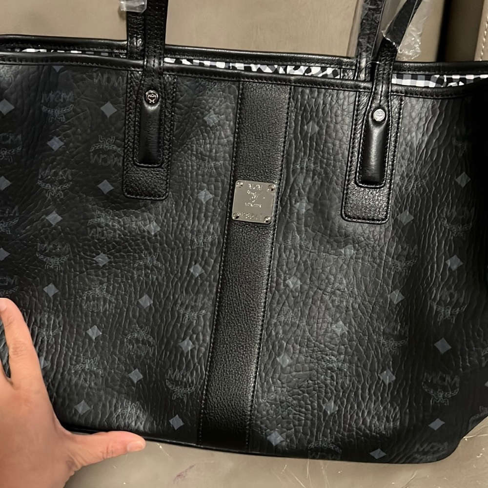 Brand MCM, color black, Size M